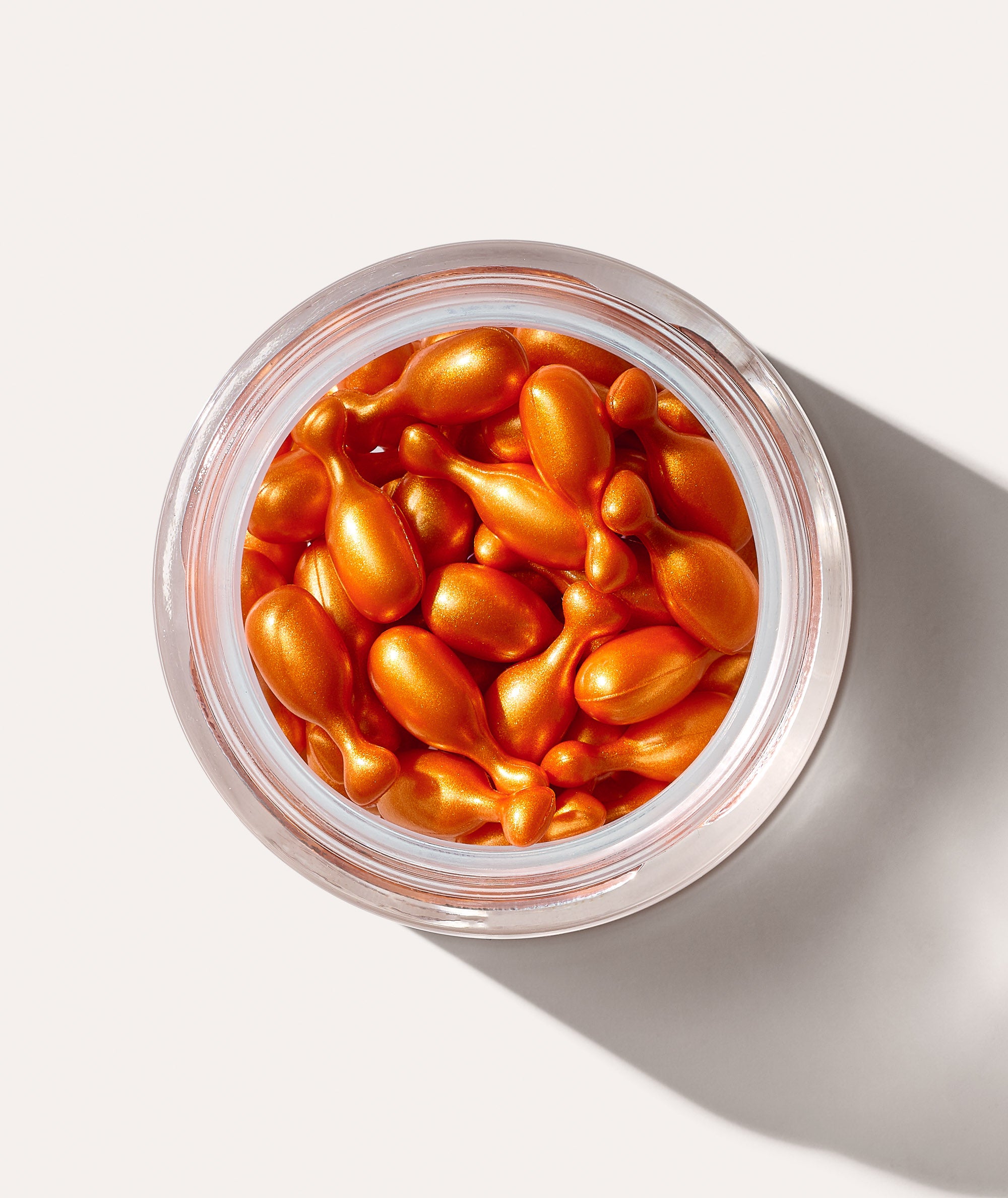 This is a picture of the Borghese Power-C Firming & Brightening Serum Capsules in a glass jar opened