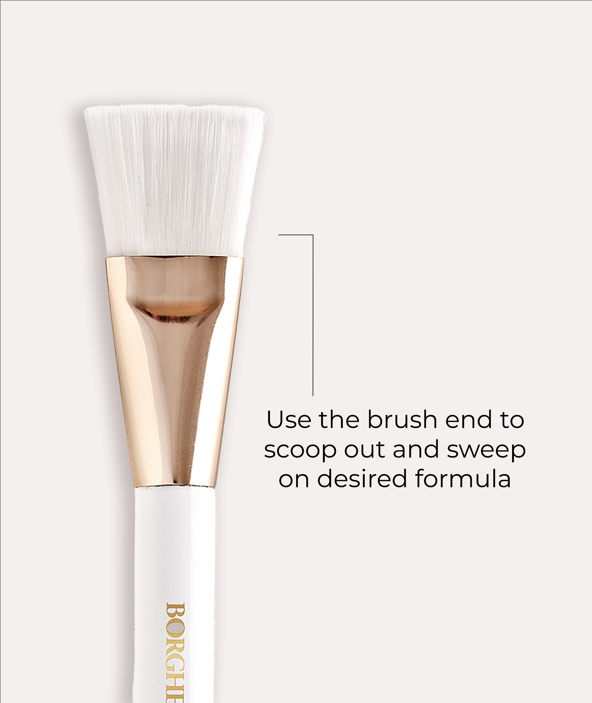 Image of brush end of the applicator which is used to scoop out and sweep on the desired formula