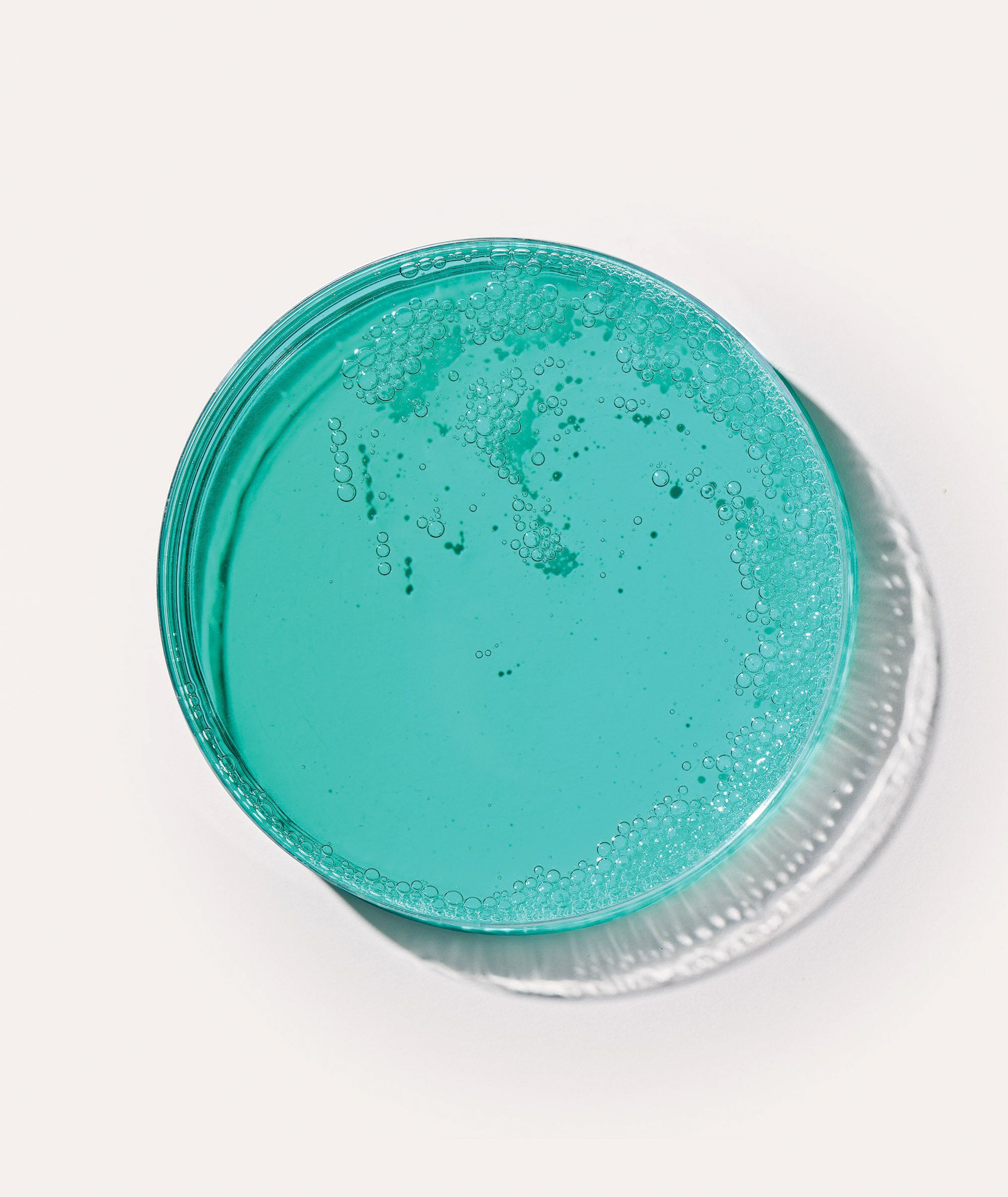 Product swatch showing the deep teal and gel texture of our Gel Delicato makeup remover
