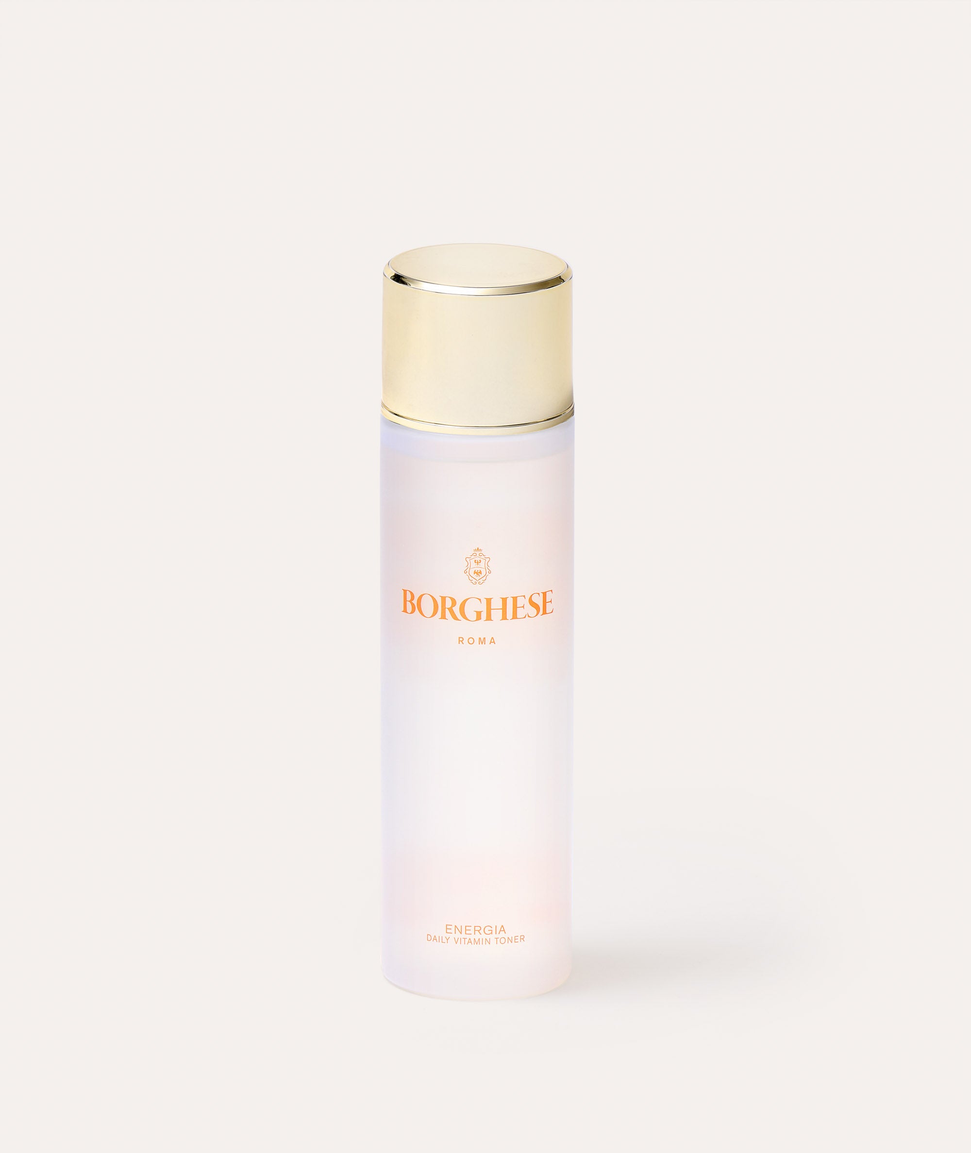 This is a picture of a person pouring Borghese ENERGIA Daily Vitamin Toner bottle