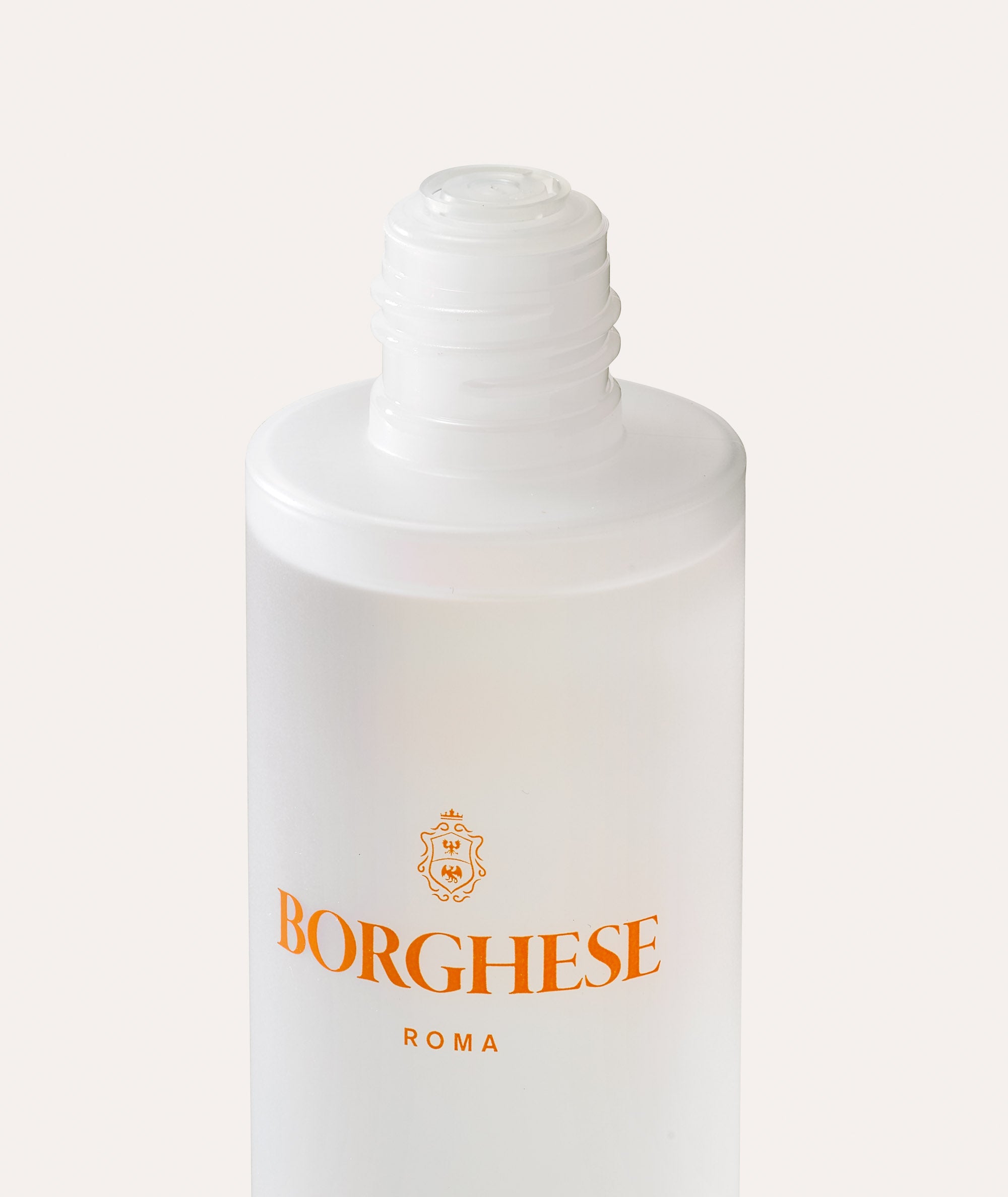 This is a picture of a person pouring Borghese ENERGIA Daily Vitamin Toner dispenser