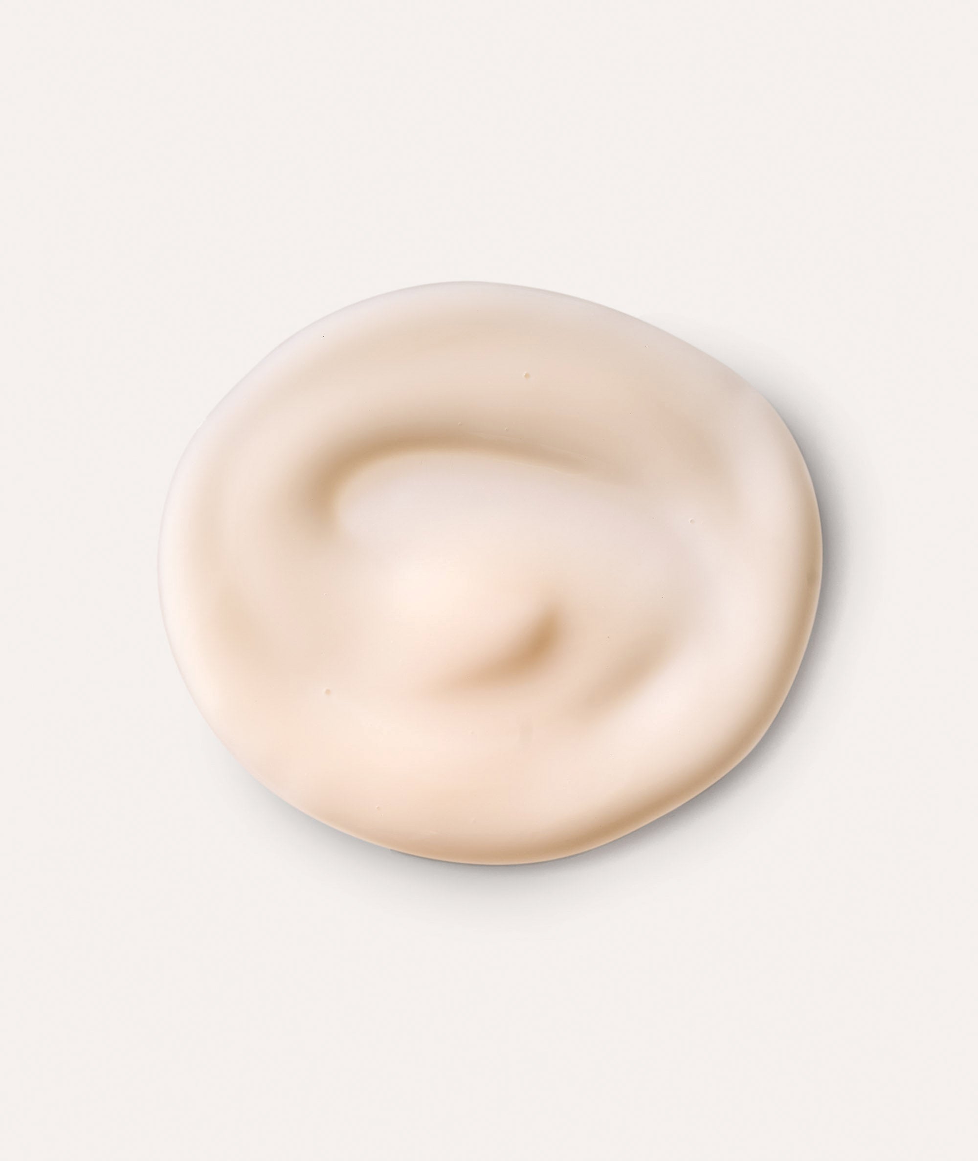 Product swatch showing the pink color and smooth, matte texture of our Equilibrio Equalizing Restorative moisturizer.
