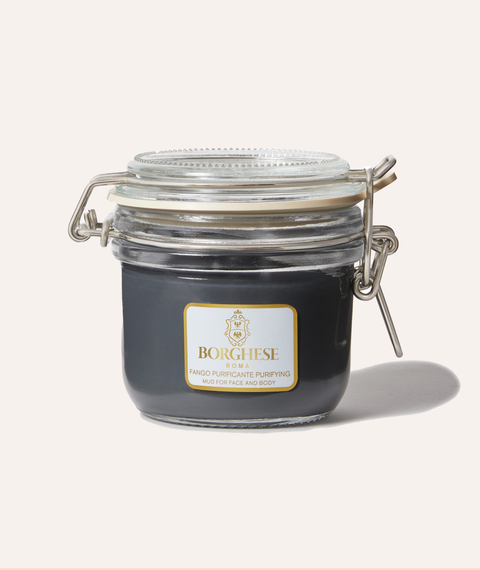 Product image of Fango Purificante Mud Mask in its iconic glass jar packaging.