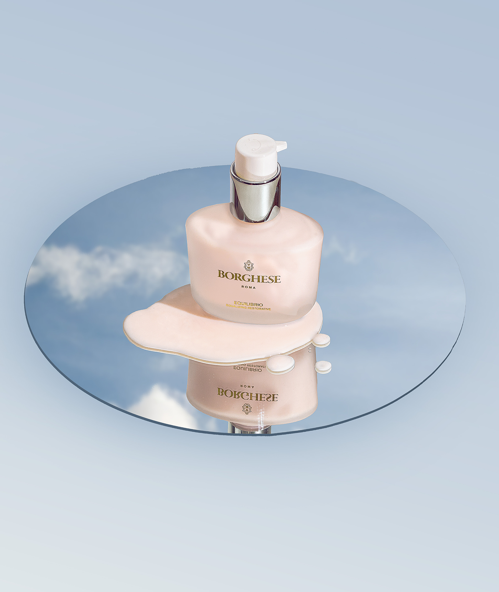 Product image of of Equilibrio Equalizing Restorative oil free moisturizer on a mirror reflecting the sky