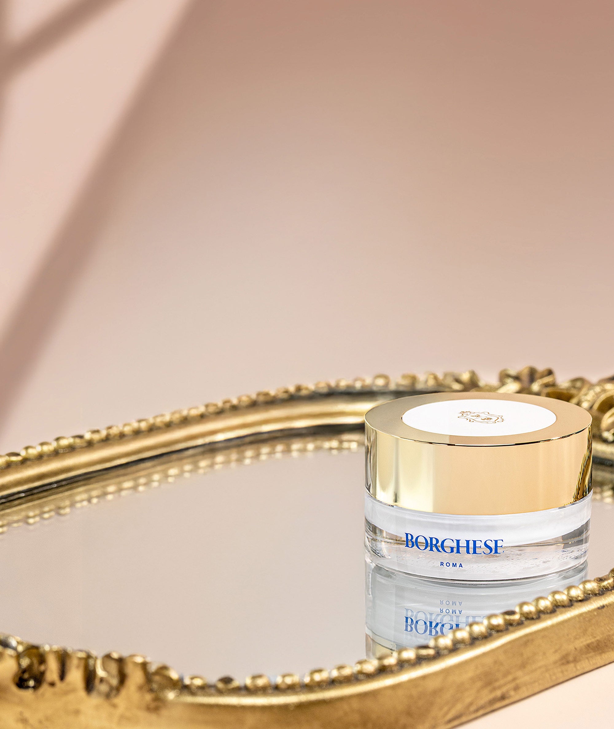 Image of Occhi Ristorativo Eye Cream jar on a mirror