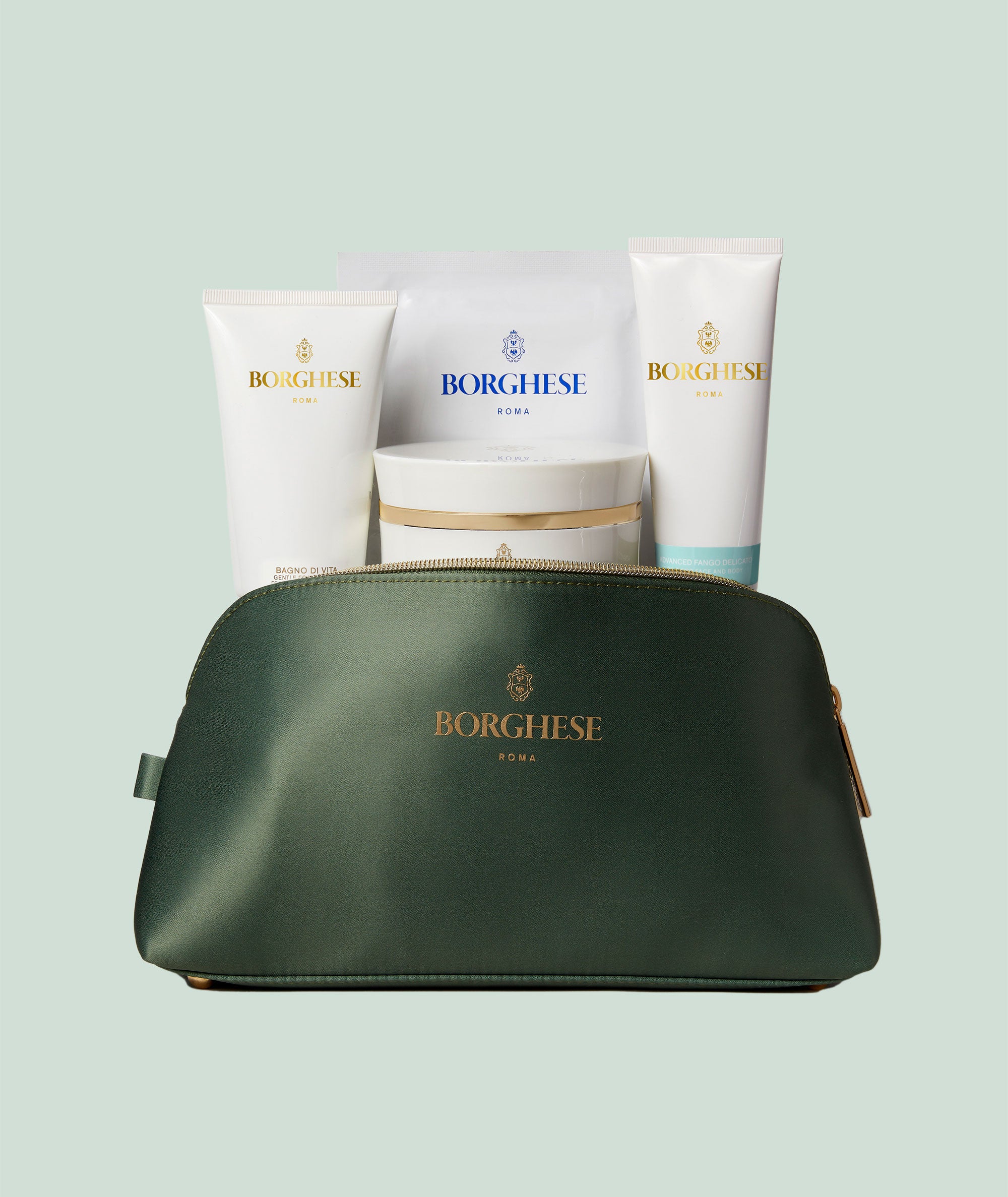 A lifestyle shot of our Winter Bodycare Heroes with a complimentary bag in Fango green