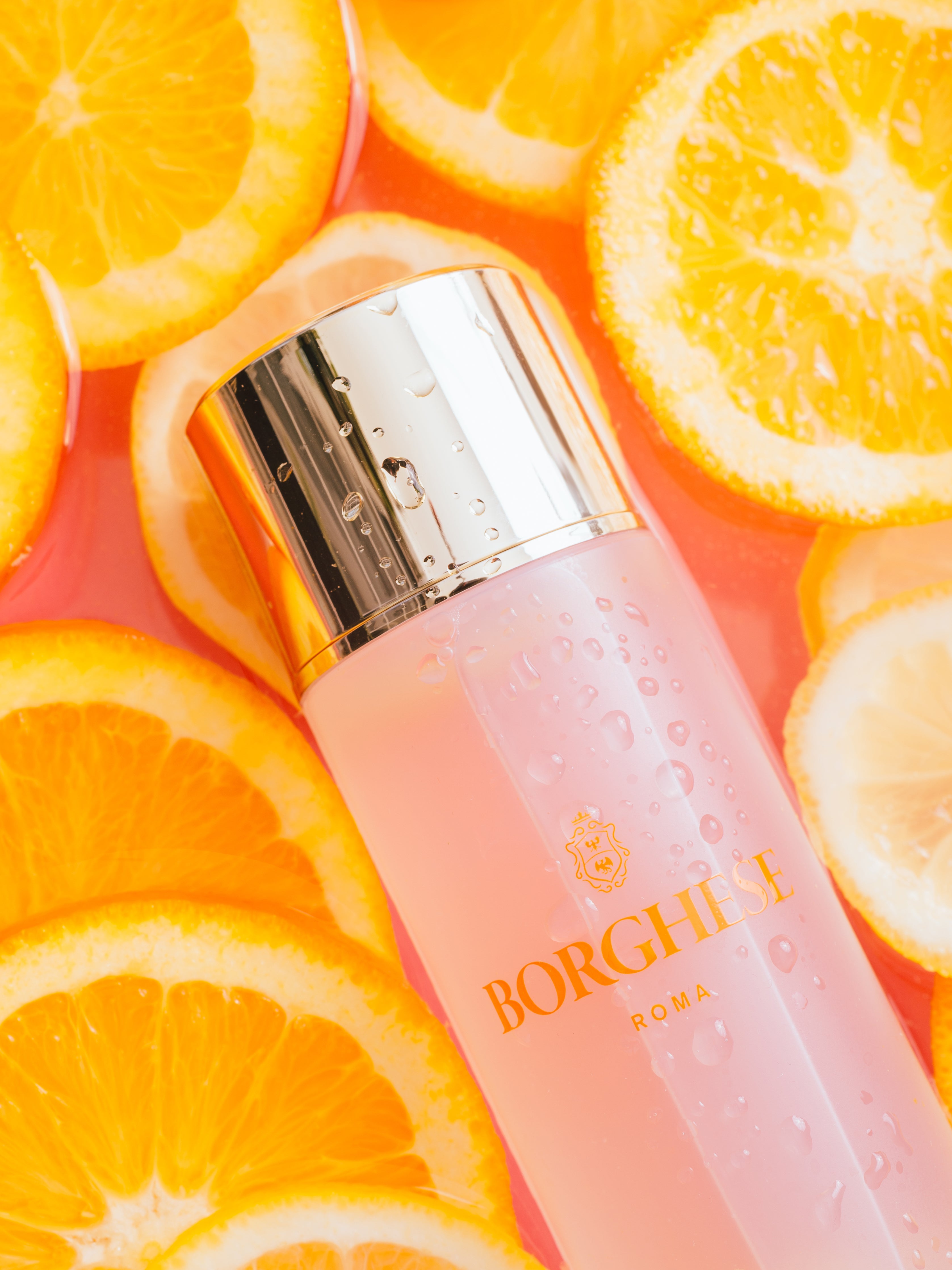 This is a picture of Borghese ENERGIA Daily Vitamin Toner bottle with orange slices